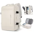 Detail shot of the large capacity interior of a cream travel backpack for organized packing - Beige (Single Vertical Zipper Front Pocket)