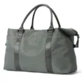 Side view detail of a durable grey travel duffle bag with reinforced straps - Dark Gray