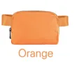 Minimalist orange outdoor sports belt bag with adjustable strap and secure zip closure - Orange