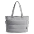 Detailed view of large capacity grey puffer tote bag with quilted texture and side pockets - Gray