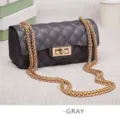 Matte charcoal gray quilted jelly crossbody bag featuring gold-tone chain strap - S / Charcoal Gray (Small)