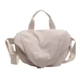 Casual nylon dumpling crossbody bag in light beige with adjustable strap - Standard Size / Off White