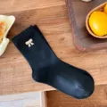 Calcetines clásicos negros de canalé con bonito detalle de lazo bordado crema - Talla única / Negro