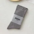 Calze a metà polpaccio in cotone grigio per donna con una confezione minimalista - Taglia unica / Grigio scuro