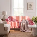 Elegant red and white striped velvet sofa cover featuring decorative ruffle edges - 132-180cm / Red and White Striped Ruffle