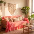 Pink and orange striped velvet sofa cover with decorative ruffle trim in boho style - 132-180cm / Red Pink Stripes