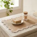 Vintage embroidered linen-style placemat with scalloped white edges on rustic table - White Curved Embroidery / 33-48 / Coffee