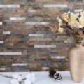 Vista detallada de pegatinas de pared de mosaico metálico 3D en tonos tierra. - Serie Mármol (Granito)