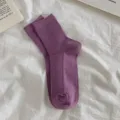 Solid color ribbed crew socks for women, comfortable cotton knit long socks in vibrant purple. - One Size (EU 35-40) / Light Purple