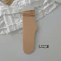 Elegant women's beige thin velvet slouch mid-calf socks featuring a fine ribbed texture - One Size / Nude