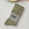 Premium olive green cotton mid-calf socks for women featuring a stylish ribbed design - One Size / Olive Green