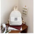 White corduroy mini backpack for women, fashion casual outdoor lifestyle SKU display. - White