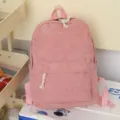 Mochila de pana rosa para estudiantes con gran capacidad y diseño minimalista suave. - Rosa
