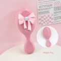 Brosse à cheveux rose mignonne avec un grand nœud décoratif en 3D pour filles et femmes - Peigne à Manche Nœud / Rose