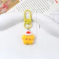 Cute yellow star keychain wearing red Santa hat, Christmas holiday gift bag charm accessory - Star