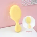 Brosse à cheveux compacte jaune pâle à coussin d'air avec picots de massage portables - Peigne à Manche Simple / Jaune Citron