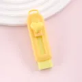 Gele intrekbare gum met hartschuiver, ideaal briefpapiercadeau voor schoolgaande kinderen. - Hart Stijl / Geel