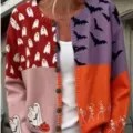 Halloween patchwork knit cardigan featuring ghost, bat, and skeleton prints in vibrant colors - S / Tops / Halloween Patchwork (202608041)