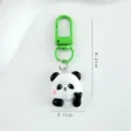 Cute cartoon panda keychain resin bag charm pendant green clasp accessory gift for students - Heart-Making Panda (A0316)
