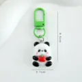 Cute cartoon panda keychain with apple pendant, resin key ring and green metal lobster clasp. - Panda Holding Apple (A0316)