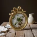 French court style vintage gold resin photo frame with bow relief and floral art insert - Round Bow Style / Outer 13*15CM