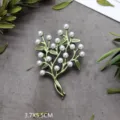 Detailweergave van de vintage bosstijl broche met groene bladeren en witte parels - Volle Parel Boomtak Stijl (SMT1005003927850261)