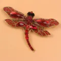 Elegant vintage gold dragonfly brooch with faceted red crystals and gemstones pin - Red