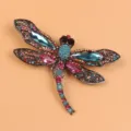 Vintage dragonfly brooch with colorful rhinestones in an elegant fashion design accessory - Blue Red