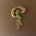 Detailed view of a vintage Baroque fairy brooch with crescent moon and iridescent tassels - Crescent Fairy Tassel Style (Style 8)