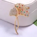 Elegant vintage gold ginkgo leaf brooch pin decorated with colorful sparkling rhinestones - Colorful