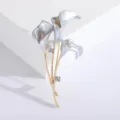 Elegant calla lily brooch with light blue enamel and sparkling rhinestones. - Blue