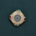 Close-up detail of a vintage Baroque square brooch with colorful gems and rhinestones - Style 8