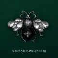 Detail view of a luxury crystal bee brooch with black enamel and vintage silver finish - Vintage Silver Insect Design (BK03)