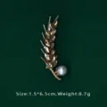 Exquisite macro detail of a luxury wheat ear brooch featuring brown crystals and white pearl - Wheat Ear Shape (BK04)