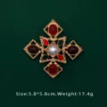 Detailed macro view of luxury red baroque brooch featuring pearl and green gemstones - Geometric Symmetry Style (BK05)