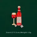 Close-up detail of red enamel wine bottle and glass brooch with crystal accents - Wine Bottle Glass Style (BK14)