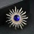 Luxury gold-tone sunburst brooch featuring a large blue crystal and clear rhinestones. - Dark Blue Sunflower Gold (9)