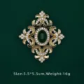 Baroque gold brooch with emerald green stone and clear rhinestones, size 5.5x5.5cm - Baroque Geometric Design (BK11)