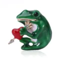 Detail of a green frog brooch holding a red heart with a gold arrow and rhinestones. - Frog Holding Red Heart Style (A11)
