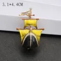 Vintage style enamel sailboat brooch featuring yellow sails and black hull detail - Yellow Steamship (Model 2)