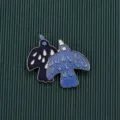 Detailed macro view of vintage baroque style double bird enamel brooch with blue patterns - Style 13