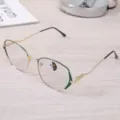 Detailed view of gold and green metal frame glasses with 2-in-1 photochromic lenses - Gold Green Frame / Photochromic Anti-Blue Light