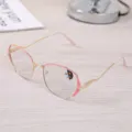 Detailed view of pink and gold vintage anti-blue light glasses with photochromic lenses. - Gold Pink Frame / Photochromic Anti-Blue Light
