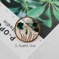 Close-up of vintage golden brooch with green enamel leaves and pearls. - Dark Green Flower One Leaf Round Style (BK11)