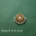 Close-up of vintage Baroque gold brooch with elegant white pearl details and crown motif - Radiating Pearl Style (B13)