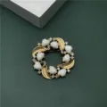 Vintage Baroque gold wreath brooch with white heart-shaped stones and crystals - Gold Leaf Heart Enamel Style