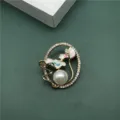 Elegant vintage baroque pearl brooch featuring a lotus enamel design and rhinestones. - Pink White Enamel Lotus Large Pearl Style
