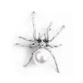 Vintage silver spider brooch featuring a large white pearl and black crystal eyes - Antique Silver White Pearl Style (SP11)