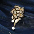 Elegant vintage crystal flower brooch featuring black stones and white pearl pendants - Gold Flower Double Pearl Pendant