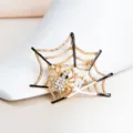 Elegant vintage golden spider web brooch with sparkling rhinestones and black enamel - Gold Web White Gem Style (SP27)